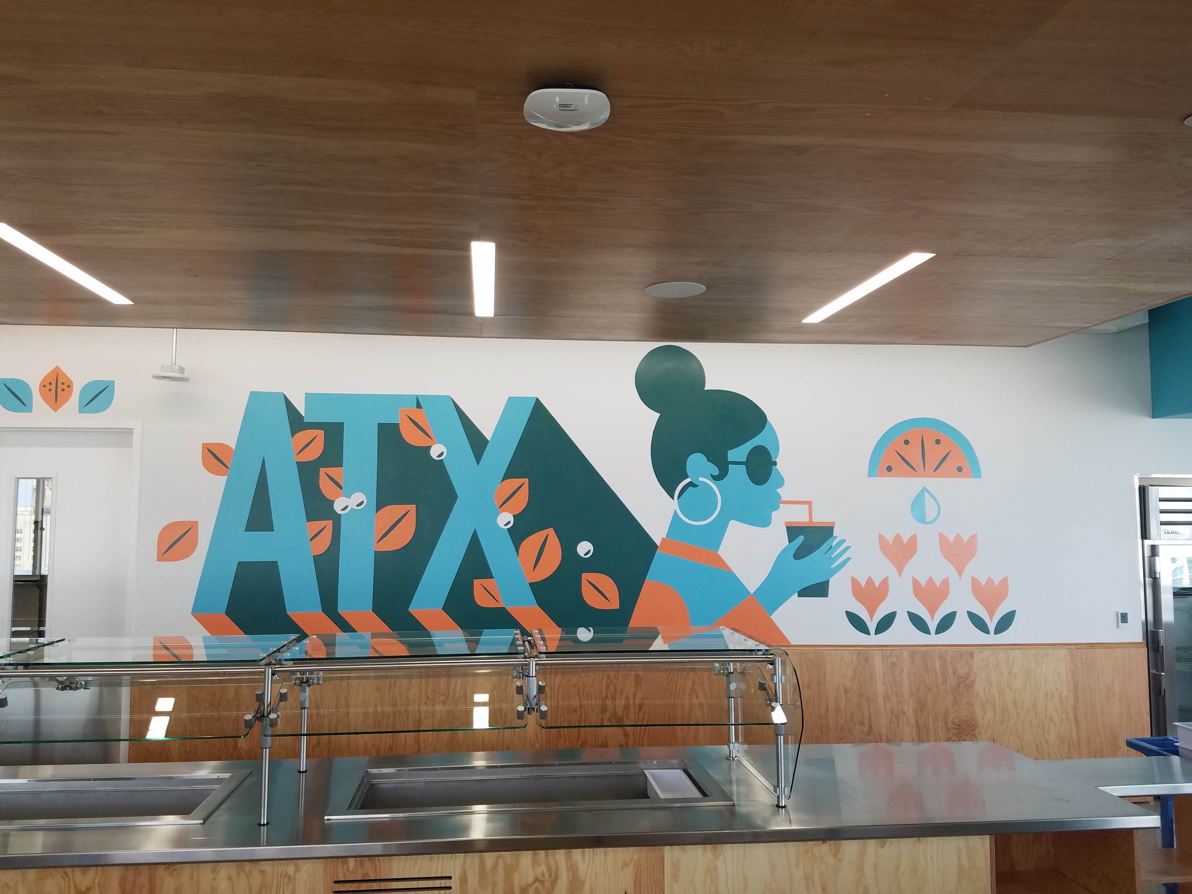 Large-scale hand-painted commercial mural by BLVD Murals