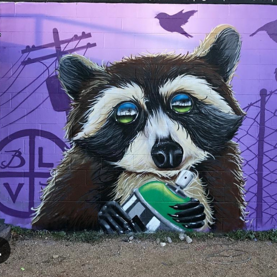 Custom hand-painted mural installation by BLVD Murals