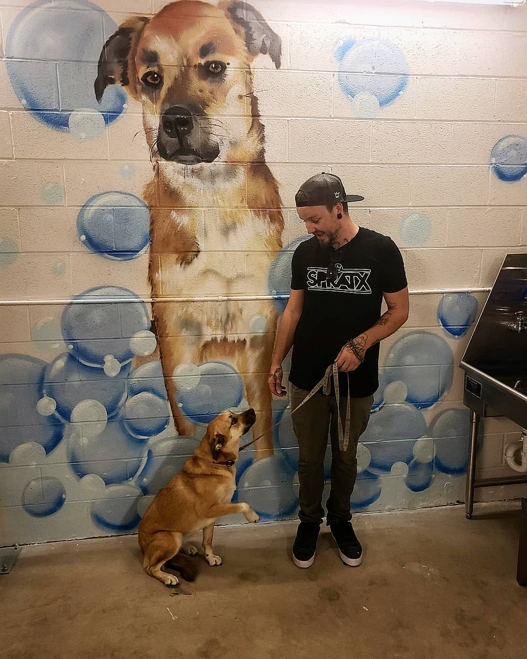 Large-scale painted mural by BLVD Murals